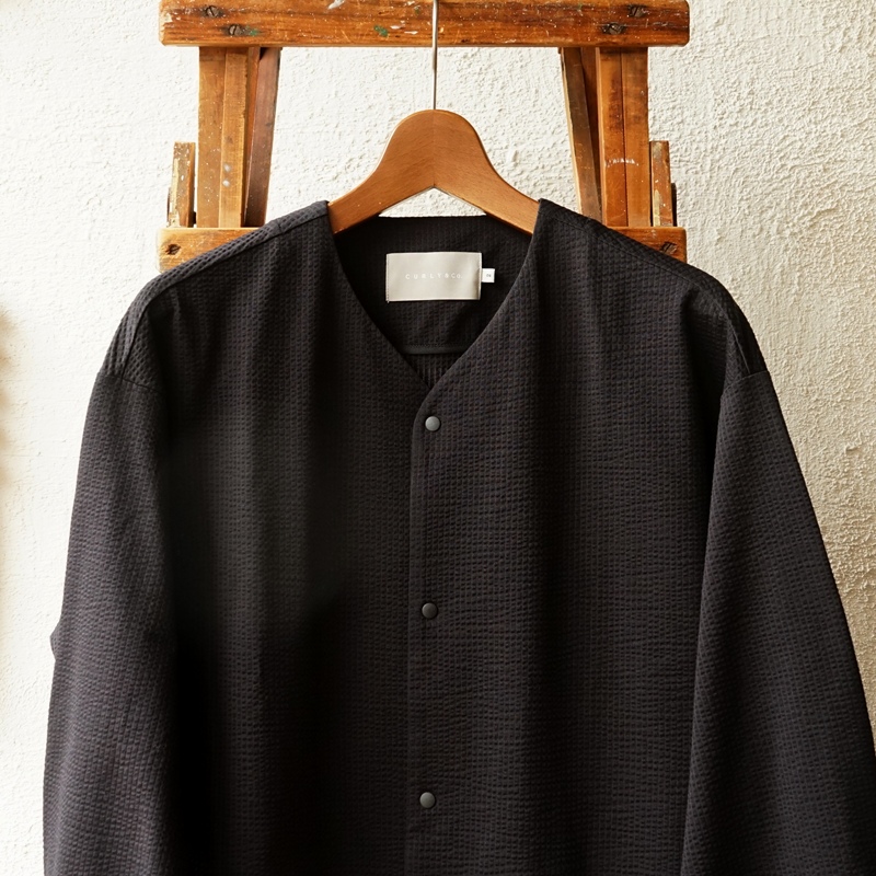 CURLY　シアサッカー素材のスナップボタンカーディガン